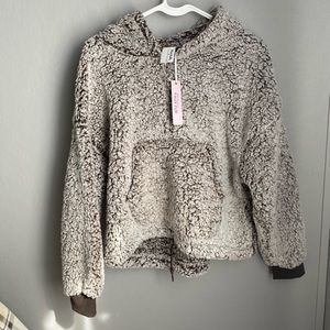 faux fur sweater with pockets and quarter zip